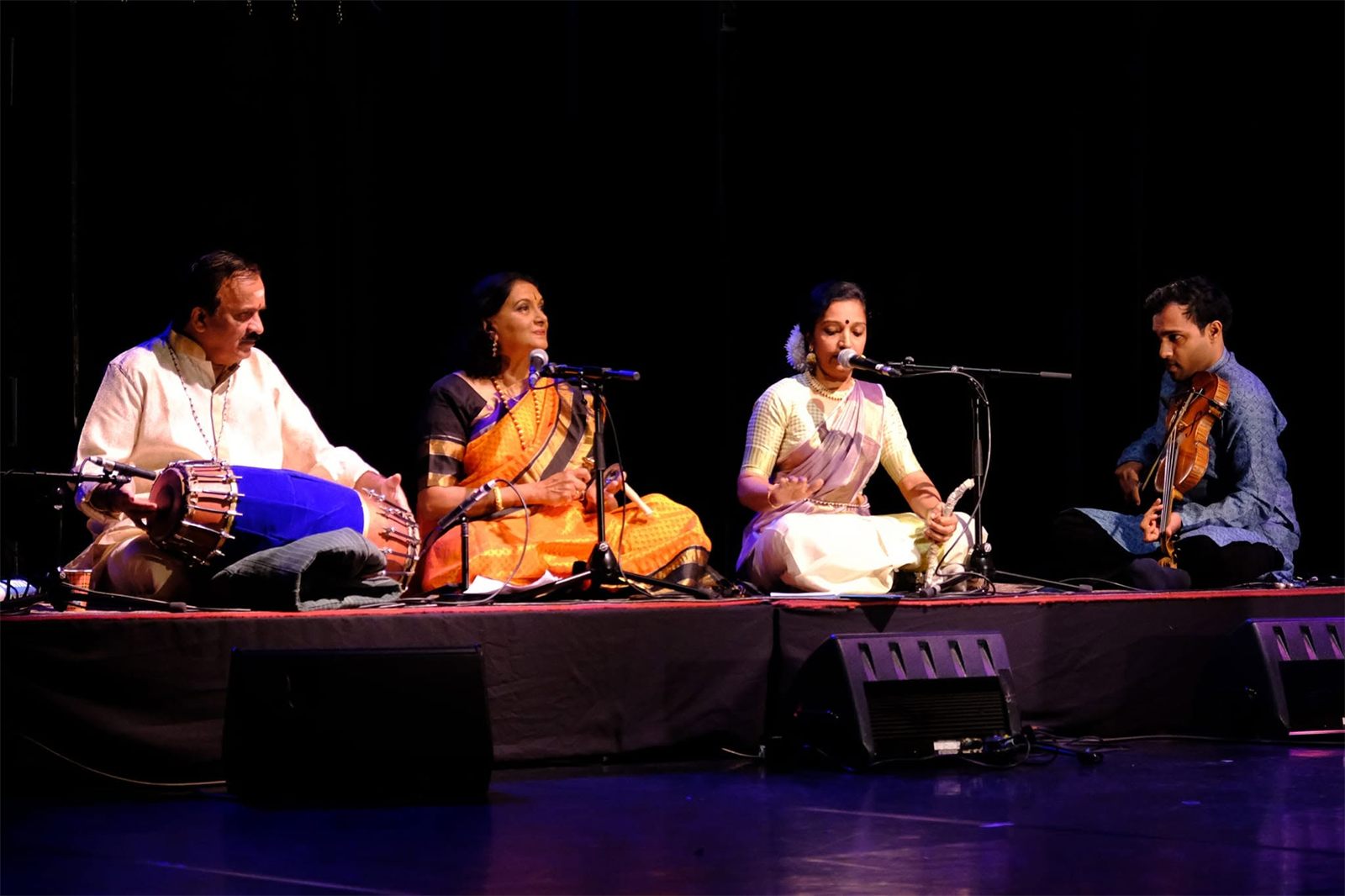 Sitrawatie Bonoo with the cymbals among the musicians of the orchestra: mridangam, vocals and violin